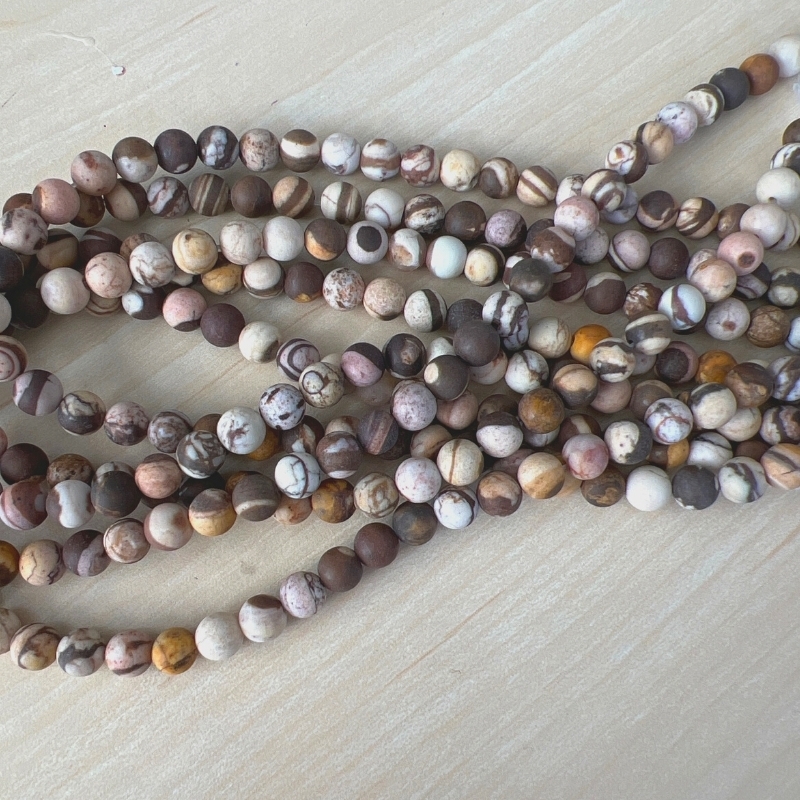 6 mm Stripe agat perler i brune nuancer - Du får en hel streng.